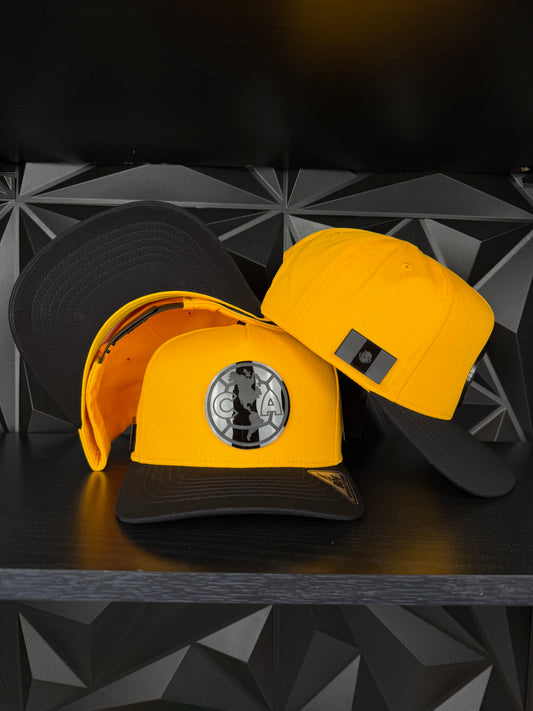 America SnapBack Gorra- Amarilla/negra